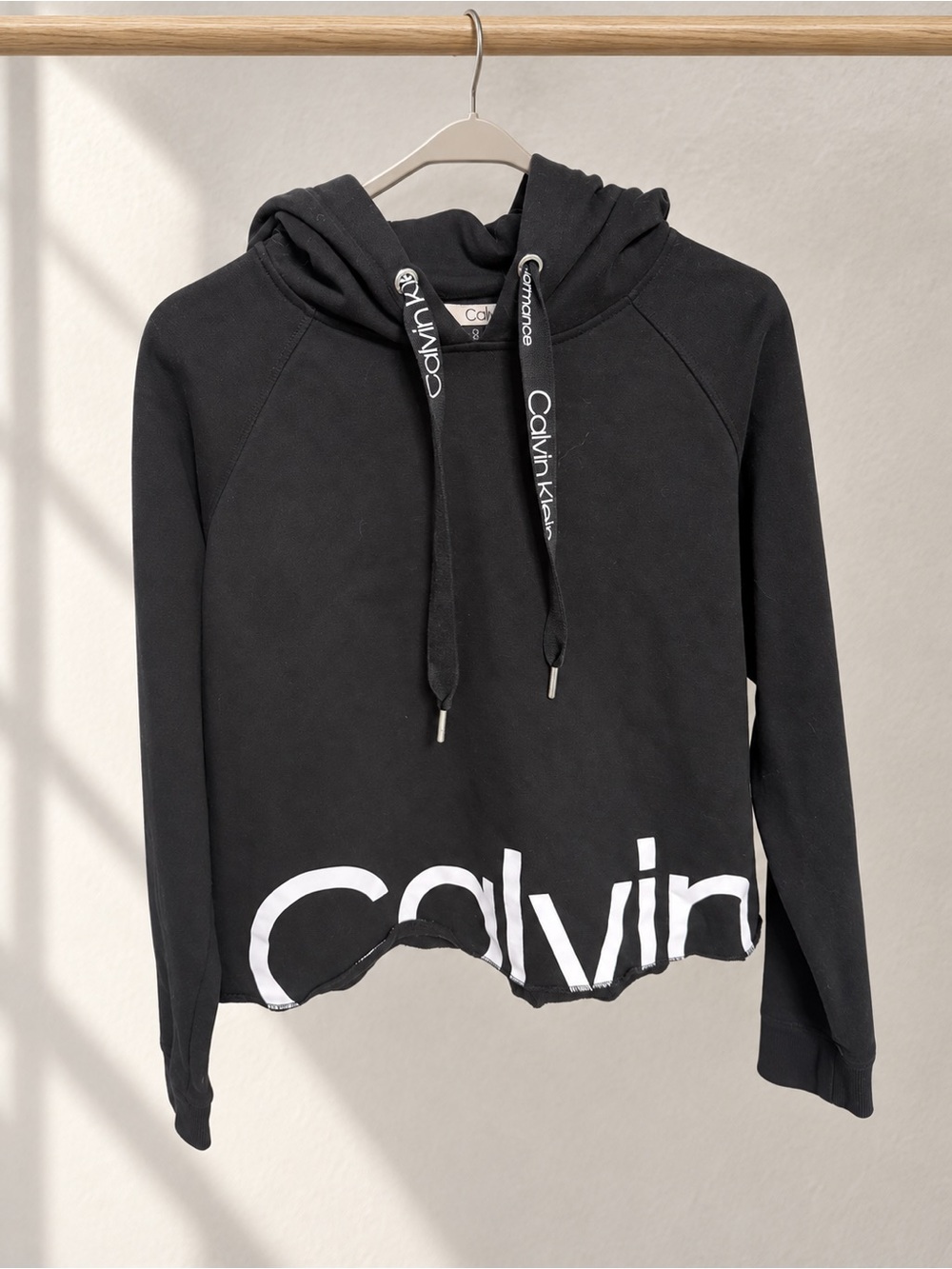 Calvin Klein Black Hoodie Sweater with White Logo Hem
